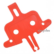 Disc brake pad outlet spacer